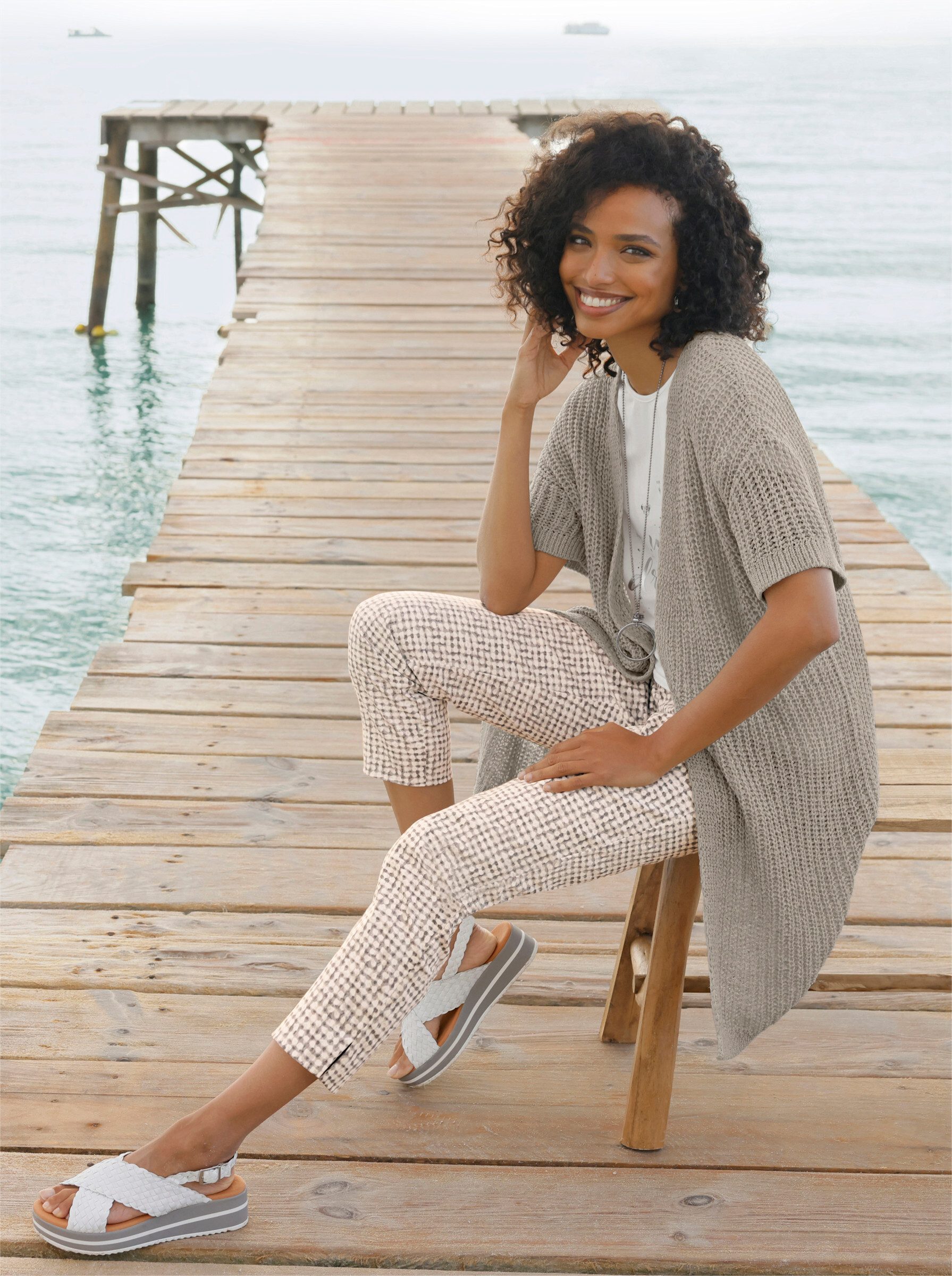 strickjacke-kurzarm-107por-1.jpg strickjacke kurzarm – Bild 1